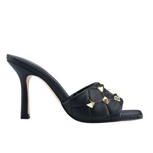 High Heeled slide sandal.  Square toe and stiletto heel with studs.